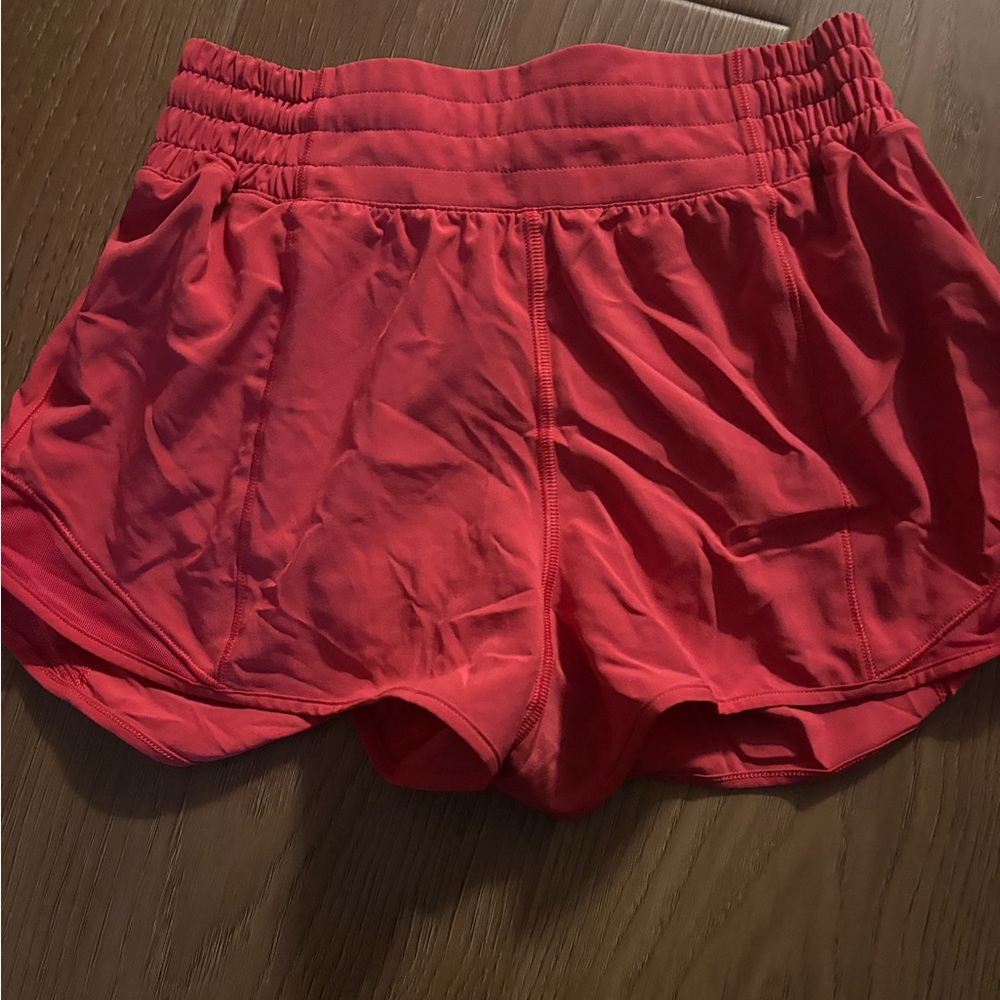 Lululemon size 4, 4 inch pink shorts
